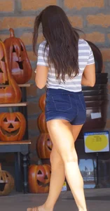 Hot brunette with a great ass in tight denim shorts