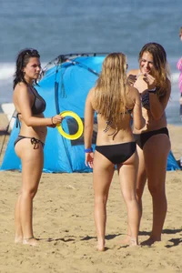 Sexy mix of girls in bikinis at the beach