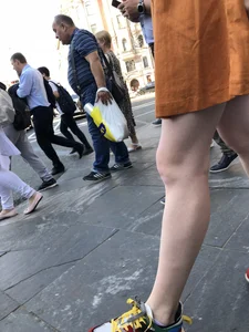 Cute Teen Girl in a Dress With Slim Legs Standing in the Subway Train, Then Crossing the Street Photo Gallery