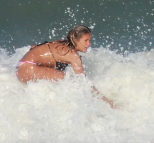 Hot surfer chicks out in the water