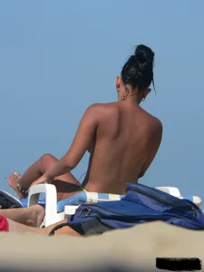 Hot ass topless beach girl with great tits lets her little brother oil up her ass in thong bikini