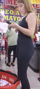 Blonde girl in a black bodysuit with an incredible body and perfect ass [OC]