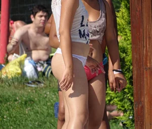 Sexy big bootied Latino girl in see thru underwear thong and white top with no bra