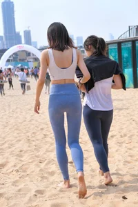 Hula hooping skinny Asian in light blue leggings with vpl