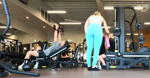 Gym blonde in turquoise leggings notices me and doesn’t mind, even moves in front of me later for some close-ups