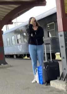 Train station pretty girl in tight jeans