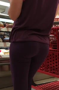 Blonde bubble butt babe shopping in tight purple leggings