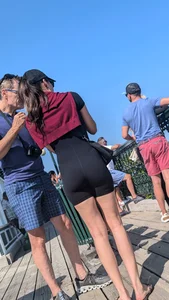 Very slim asian in black short legging. (VPL) OC