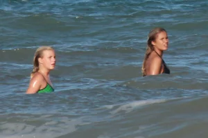 Hot surfer chicks out in the water
