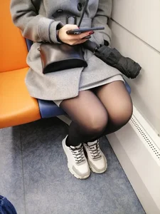 Cute Redhead in Black Pantyhose Sitting in Public Train Candid Photos
