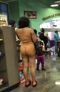 Latina with hard nipples and a big booty in tight spandex shorts outfit