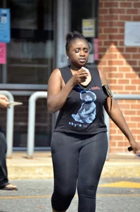 Chubby black lady with big tits and no bra lets it slip
