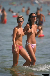 Sexy candid topless and nude beach girls