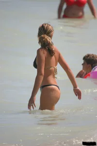 A bunch of sexy beach voyeur babes in bikinis, thongs and topless