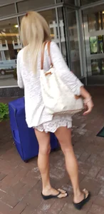 Cute girl with big boobs in loose white shorts