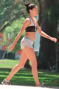 Ebony babe in Hooters shorts out for a run and walk