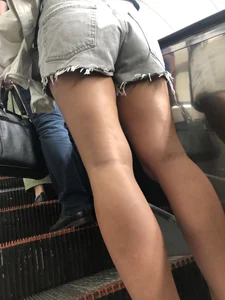 Hot Legs and Ass in Denim Fringe Shorts Escalator Closeup Creepshots
