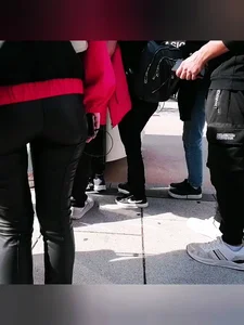 Ass in leather pants closeups on the street