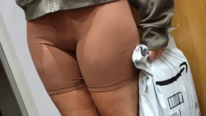 Close up Cameltoe in Brown Shorts with Amazon Package in Hand