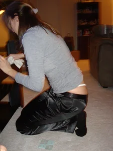 Girlfriend showing a lot of her thong while cleaning