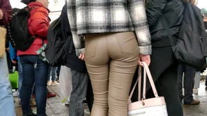 College girl in brown leather pants