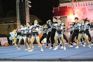 Bunch of athletic Thai cheerleaders at a competition