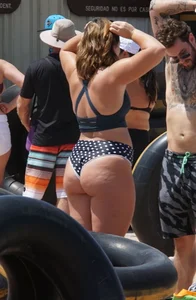 Girls in bikinis getting ready for tubing