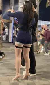 Asian baddie with great legs, heels and Cop costume