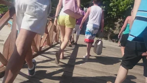 Milf in yellow shorts with vpl and a wedgie