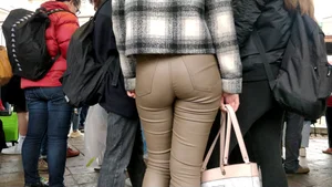 College girl in brown leather pants