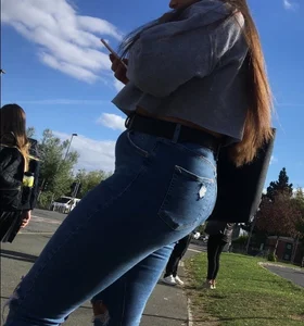 Long haired beauty teen with a tight ass in jeans