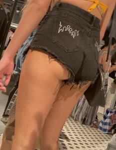 T33ns shopping denin short close up