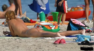 Beach voyeur girls in bikinis, thongs and topless