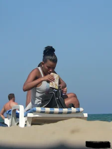 Hot ass topless beach girl with great tits lets her little brother oil up her ass in thong bikini