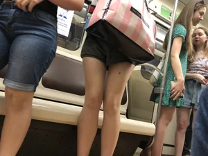 Subway Candid Girl in a Mask And Shorts - Long Sexy Legs With a Mole Train Creepshots