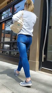 Blonde in tight jeans catches wise