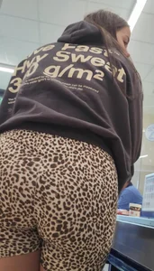 Thick brunette in short leggings and company