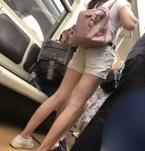 Cute Teen Girl in Shorts in Subway Train Candid Photos