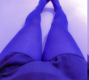 Legs in Black Pantyhose And a Skirt Closeup Selfie