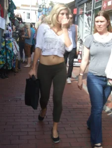 Sexy blonde out walking in green leggings with vpl