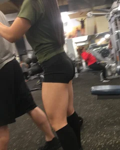 Girl with Muscular Legs in a Gym Hot Candid Photos