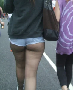 Candid cunny brunette in pantyhose and shorts showing her ass cheeks