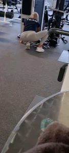 Sexy skinny blonde in grey leggings at the gym photo and video