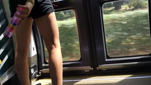 Girl with Long Skinny Legs in Shorts and Flats Bus Creepshot
