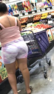 Thick Latina babe with a nice ass in tight patterned shorts