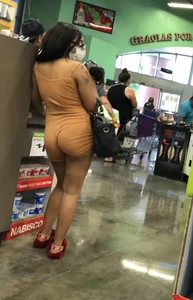 Latina with hard nipples and a big booty in tight spandex shorts outfit