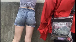 Tight ass in grey jean shorts.