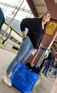 Train station pretty girl in tight jeans