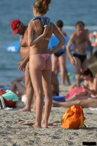 Beach voyeur girls in bikinis, thongs and topless