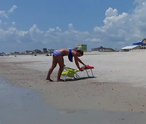 Girl in Swimsuit Lying on the Beach on Sunbed with Spread Legs Creepshots Gallery